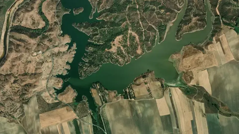 Satellite view of Corumbel Bajo reservoir, Tinto, Odiel y Piedras, Spain