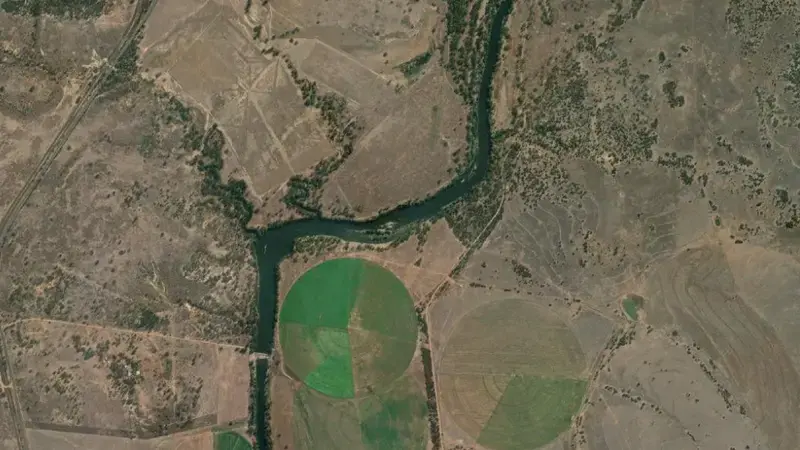 Satellite view of John Goleby Weir reservoir, Queensland, Australia